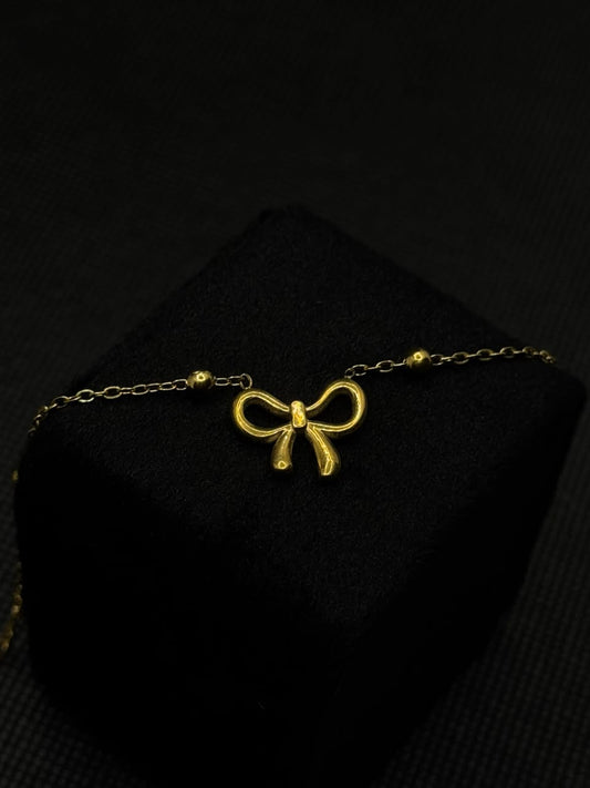 Golden Bow Charm Bracelet